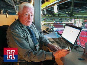 Pat Hickey at his laptop in the Bell Centre press box