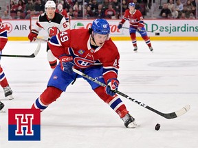 Montreal Canadiens forward Rafael Harvey-Pinard (49) plays the puck during the second period of the game against the New Jersey Devils on March 11, 2023