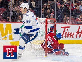 Montreal Canadiens forward Josh Anderson crashes into the net afteer being taken down by Tampa Bay Lightning's Mikhail Sergachev on March 21, 2023. Anderson left the game with an injury.