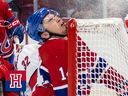 Montreal Canadiens captain Nick Suzuki hits his head on the crossbar as he crashes into the Carolina Hurricanes net during first period on March 7, 2023.