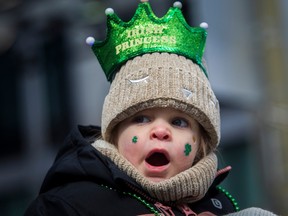A big, long St. Patrick's Day Parade can be tiring for an "Irish Princess" like Liana Quinn. Thousands of Montrealers attended the event on Ste.-Catherine St. in Montreal on Sunday, March 19, 2023.