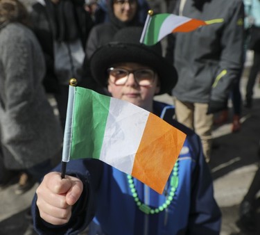 Liam Peterson shows his Irish colours during the St. Patrick's Parade in Montreal on March 19, 2023.