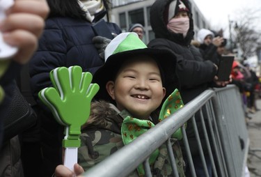 Evan Chung has some fun during the St. Patrick's Parade in Montreal on March 19, 2023.