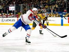 Montreal Canadiens defenceman Mike Matheson shoots the puck against Vegas Golden Knights centre Paul Cotter during the third period on March 5, 2023, in Las Vegas.