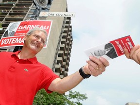 Marc Garneau campaigns during a byelection in 2008.
