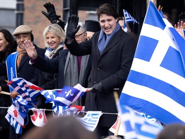 Canadian Prime Minster Justin Trudeau waves to the crowd as he takes part in the Greek Independence Day celebrations in Montreal on Sunday, March 26, 2023.