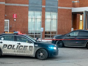 a laval police vehicle and bullet-riddled Mercedes GLE 53