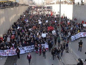Students demonstrate against austerity measures and government cuts at a protest in Montreal on Thursday, April 2, 2015.
