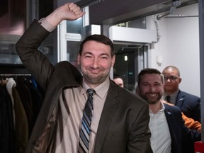 Québec solidaire's Guillaume Cliche-Rivard celebrates his byelection win with party co-spokesperson Gabriel Nadeau-Dubois in the Montreal riding of Saint-Henri—Sainte-Anne on Monday night.