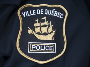 A Quebec City police badge is seen in Quebec City, Friday, Dec. 3, 2021.