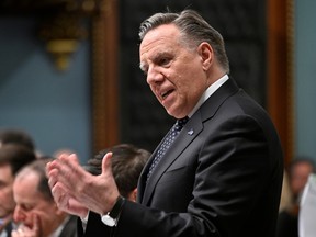Quebec Premier François Legault responds to the opposition during question period at the legislature in Quebec City, Tuesday, Feb. 21, 2023.