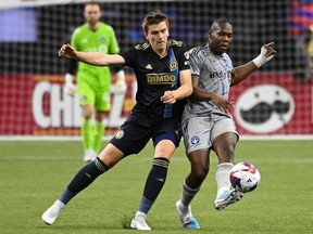 Philadelphia Union defender Jakob Glesnes (5) defends the ball against CF Montréal's Kamal Miller (3) during the first half at Olympic Stadium in Montreal on Saturday, March 18, 2023.