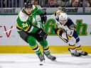 Knights' Logan Mailloux, a controversial first-round draft pick of the Canadiens in 2021, skates away from Erie's Taeo Artichuk during a game in London, Ont., in February.