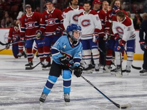 Brysen Byron, son of Montreal Canadiens' Paul Byron, heads to the net in a shootout competition at the Montreal Canadiens skills competition at the Bell Centre in Montreal Sunday, Feb. 19, 2023.