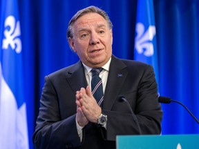 MONTREAL, QUE.: \March\ 24, 2023 -- Quebec Premier Francois Legault holds a press conference in Montreal Friday March 24, 2023 to comment on the federal government's agreement with the United States to close Roxham Road.