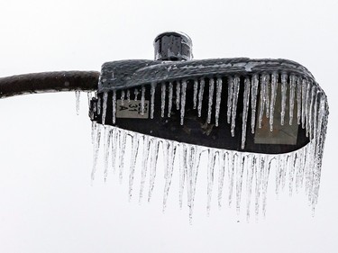 Icicles form on a street light on 55th Avenue in the Lachine borough of Montreal Wednesday April 5, 2023.