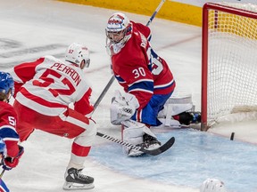 Detroit Red Wings left wing David Perron (57) scores against the Montreal Canadiens goaltender Cayden Primeau (30) during 3rd period NHL action at the Bell Centre in Montreal on Tuesday April 4, 2023.
