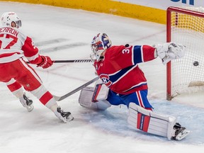 Detroit Red Wings left wing David Perron (57) puts the puck past Montreal Canadiens goaltender Cayden Primeau (30) during 1st period NHL action at the Bell Centre in Montreal on Tuesday April 4, 2023. Dave Sidaway / Montreal Gazette