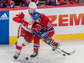 Montreal Canadiens left wing Michael Pezzetta (55) collides with Detroit Red Wings defenseman Olli Maatta (2) at the Montreal blue line during 1st period NHL action at the Bell Centre in Montreal on Tuesday April 4, 2023.