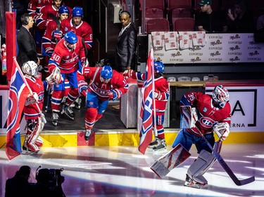 The Montreal Canadiens head onto the ice for their game against the Washington Capitals at the Bell Centre in Montreal on Thursday April 6, 2023.