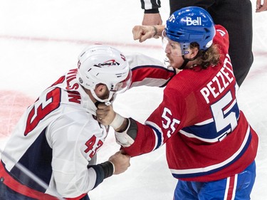 Montreal Canadiens left wing Michael Pezzetta (55) and Washington Capitals right wing Tom Wilson (43) drop the gloves during 1st period NHL action at the Bell Centre in Montreal on Thursday April 6, 2023.