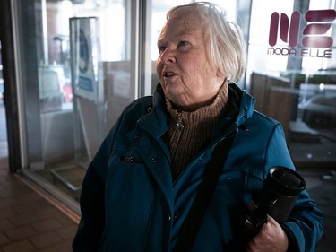Beverly Baxter has a hot cup of joe at Pointe-Claire Plaza April 7, 2023, two days after an ice storm knocked out power across the province.