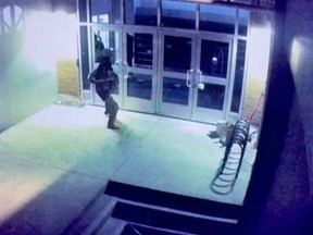 Surveillance video shows a man attempting to forcibly break in to the Al-Omah Al-Islamiah mosque in downtown Montreal on Sunday, April 9, 2023.