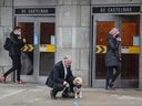 Aref Salem, opposition leader at the city of Montreal, with his dog Bella in front of the de Castelnau métro station last year.