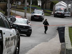 Laval and Sûreté du Québec police at the scene of a shooting on Havre St. in Chomedey, Laval on Thursday, April 20, 2023. On man was dead following the incident outside his home.