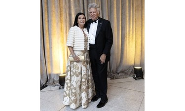 Suzanne McPeak and Charles Sirois at the Daffodil Ball in Montreal April 20, 2023. McPeak is wearing Carolina Herrera.