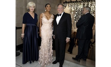 Varda Etienne and Quebec Premier François Legault with his wife, Isabelle Brais, left, at the Daffodil Ball in Montreal.