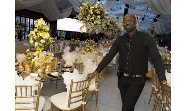 Samuel Gustinvil checks to make sure the room is ready moment before guests arrive at the Daffodil Ball, in Montreal April 20, 2023.