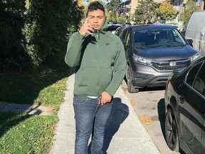 Zackhry Ramnath stands on a sidewalk in a Facebook photo