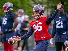 Punter Joseph Zema kicks the ball during Montreal Alouettes training camp practice in Trois-Rivières on May 26, 2022.