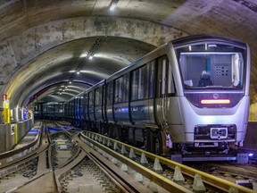 A métro is parked at the entrance to one of the maintenance tunnels in the STM's new underground garage.
