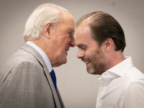 Antoine Dionne Charest, right, is seen with former prime minister Brian Mulroney at an event in Montreal in August 2022. The son of former Quebec premier Jean Charest is a member of the 14-person Committee for the Revival of the Quebec Liberal Party.