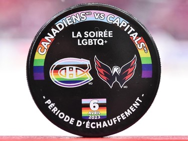 A closeup view of the official warm-up puck celebrating Pride Night prior to the game between the Montreal Canadiens and the Washington Capitals at Centre Bell on April 6, 2023 in Montreal.
