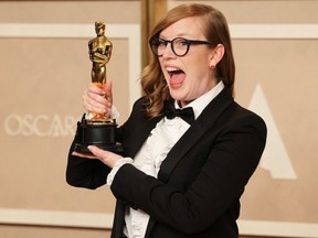 Sarah Polley poses with the Oscar for Best Adapted Screenplay for Women Talking in the Oscars photo room at the 95th Academy Awards in Hollywood on March 12, 2023.