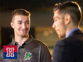 Logan Mailloux of the London Knights is interviewed Thursday morning by TVA Sports Anthony Martineau as a pick for the Montreal Canadians at Budweiser Gardens in London, Ont.