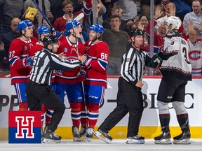 Montreal Canadiens rookie Juraj Slafkovsky yells at Arizona Coyotes Josh Brown after scoring his first caree goal during second period of National Hockey League game in Montreal Thursday October 20, 2022.