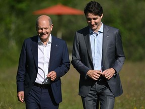 German Chancellor Olaf Scholz, left, and Prime Minister Justin Trudeau can thank columnist Josh Freed, among others, for their tieless freedom: "I'd like to think I was among those who sparked the revolution."