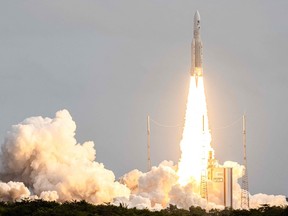 Arianespace's Ariane 5 rocket lifts off on Friday, April 14, 2023, at the Guiana Space Center in Kourou, French Guiana. The European Space Agency's JUICE mission to explore Jupiter's icy, ocean-bearing moons will again try to blast off on April 14, 2023, a day after the first launch attempt was called off because of the threat of lightning.