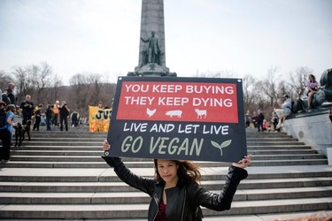 Protesters wait for the march to begin during the Earth Day Protest on April 22, 2023, in Montreal.