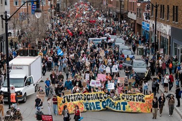 Protesters march during the Earth Day Protest on April 22, 2023, in Montreal.