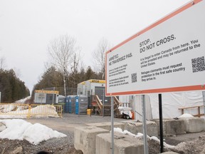 A sign advising people that entrance to Canada via Roxham Road is illegal is shown on the Canada/U.S. border in Hemmingford, Que., on Saturday, March 25, 2023.