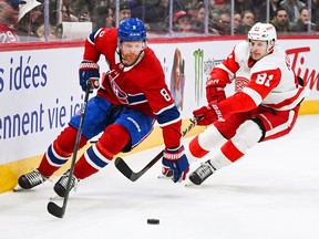 Canadiens defenceman Mike Matheson eludes Red Wings' Dominik Kubalik during a game at the Bell Centre this month.
