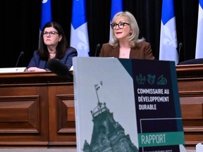 Quebec's sustainable development commissioner Janique Lambert presents her annual report, Wednesday, April 26, 2023 at the legislature in Quebec City. Moisette Fortin, Director General of Audits, left, looks on.