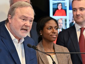 André Pratte, left, and Bourassa-Sauvé MNA Madwa-Nika Cadet are co-chairs of the Committee for the Revival of the Quebec Liberal Party. Party president Rafael Primeau-Ferraro is at right.