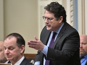 Quebec Education Minister Bernard Drainville responds to the Opposition during question period at the legislature in Quebec City, Wednesday, March 29, 2023. Muslim groups are speaking out against the Quebec government's intention to ban prayer spaces in public schools, saying they will monitor how the Education Department enforces its new rules.