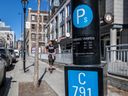 A parking meter on Bishop St. shows extended hours on April 14, 2023. The mayor's office says the municipal parking authority jumped the gun in announcing the change.